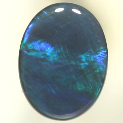 SOLID BLACK OPAL Sheen pattern of turquoise to green to ocean blue